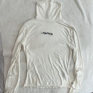 ángel energy turtle neck